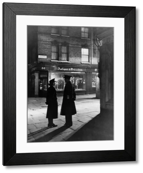 Framed Print : Two police officers patrol Shepherds Market, London Framed Print : Two police officers patrol Shepherds Market, London