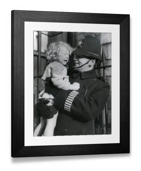 Framed Print : Metropolitan Police officer and crying child Framed Print : Metropolitan Police officer and crying child