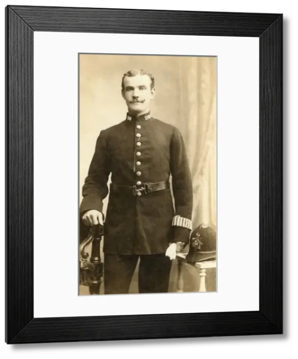 Framed Print : Metropolitan Police officer in studio portrait Framed Print : Metropolitan Police officer in studio portrait