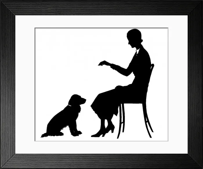 Framed Print : Silhouette of woman training dog Framed Print : Silhouette of woman training dog