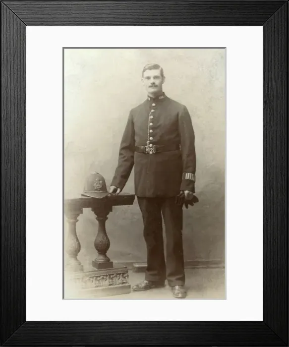Framed Print : Metropolitan Police officer in studio portrait Framed Print : Metropolitan Police officer in studio portrait