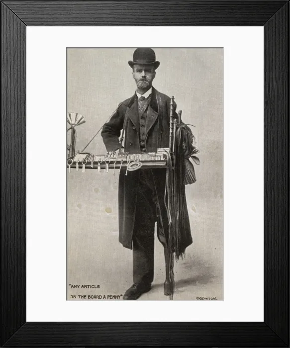 Framed Print : Peg-leg peddlar with his tray of items for sale Framed Print : Peg-leg peddlar with his tray of items for sale