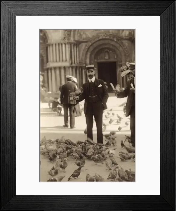 Framed Print : Feeding pigeons before St Marks Basilica, Venice, Italy Framed Print : Feeding pigeons before St Marks Basilica, Venice, Italy