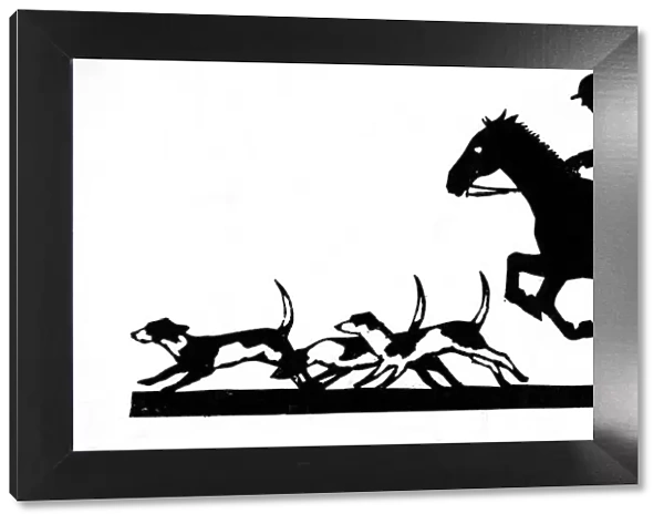Silhouette of huntsman and hounds