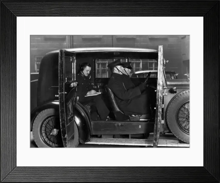 Framed Print : Metropolitan Police officers inside a car Framed Print : Metropolitan Police officers inside a car