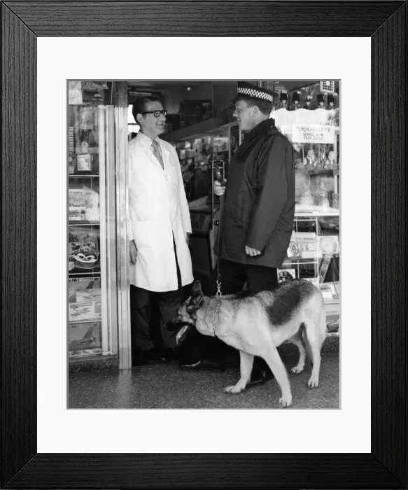 Framed Print : Metropolitan police officer and dog with shopkeeper Framed Print : Metropolitan police officer and dog with shopkeeper