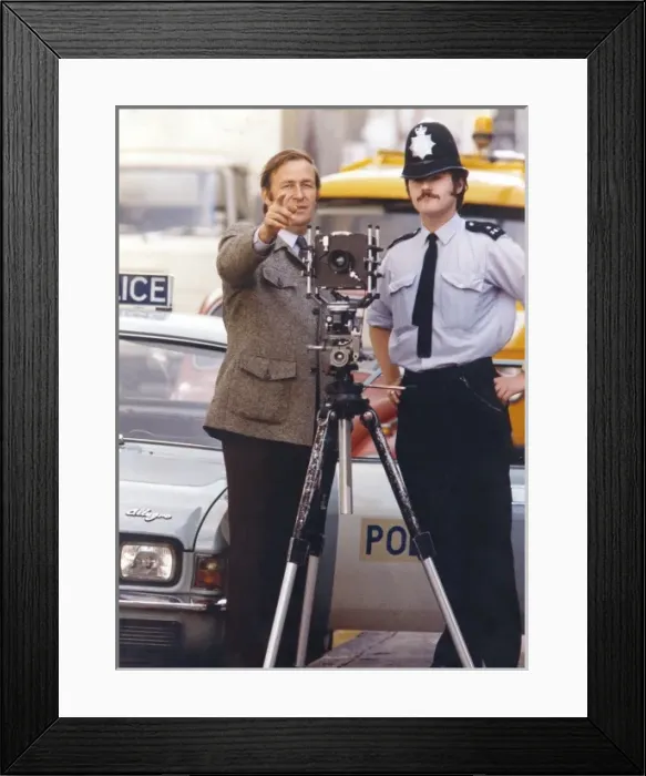 Framed Print : Metropolitan police photographer at work Framed Print : Metropolitan police photographer at work