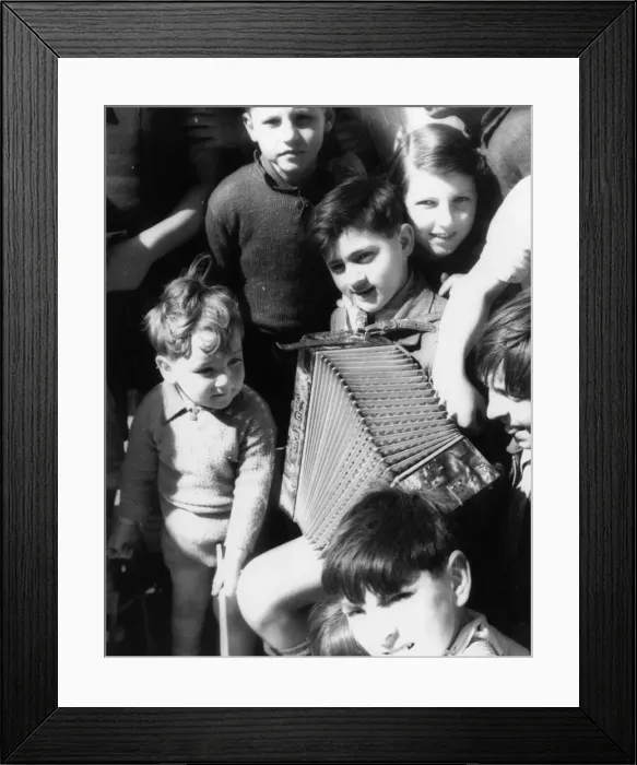 Framed Print : Street music: accordion player, 1930s Framed Print : Street music: accordion player, 1930s