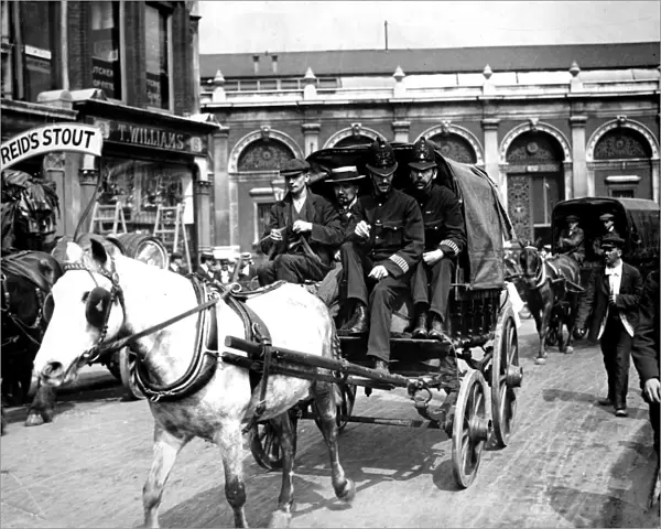 Police escorting cart during Dock Strike, London