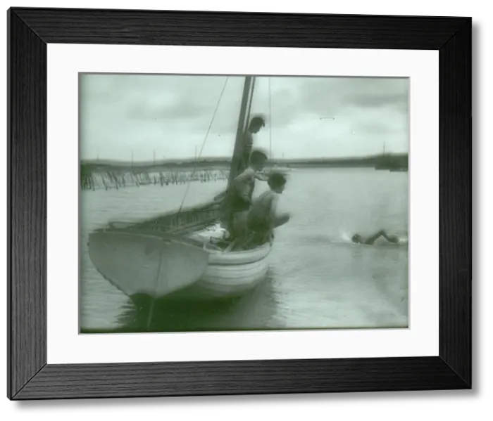 Framed Print : Sea Scouts swimming off the side of a dinghy Framed Print : Sea Scouts swimming off the side of a dinghy