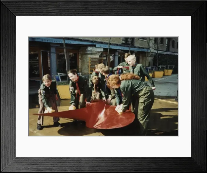 Framed Print : Scouts cleaning propeller near Tower Bridge, London Framed Print : Scouts cleaning propeller near Tower Bridge, London