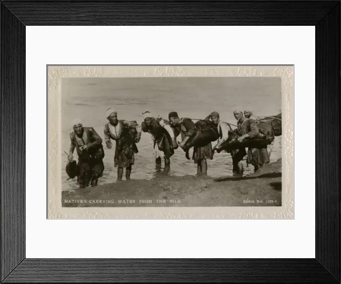 Framed Print : Water carriers with water from the Nile, Egypt Framed Print : Water carriers with water from the Nile, Egypt