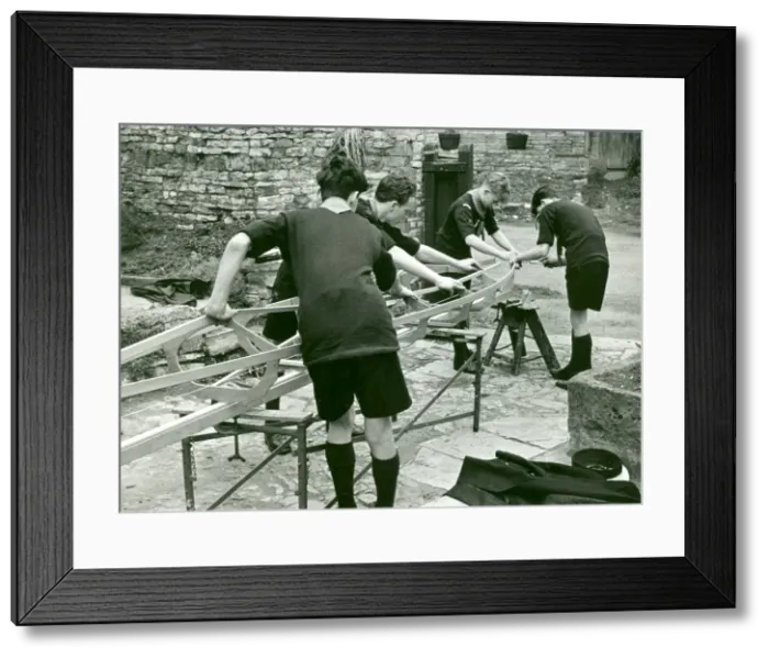 Framed Print : Sea Scouts building a kayak Framed Print : Sea Scouts building a kayak