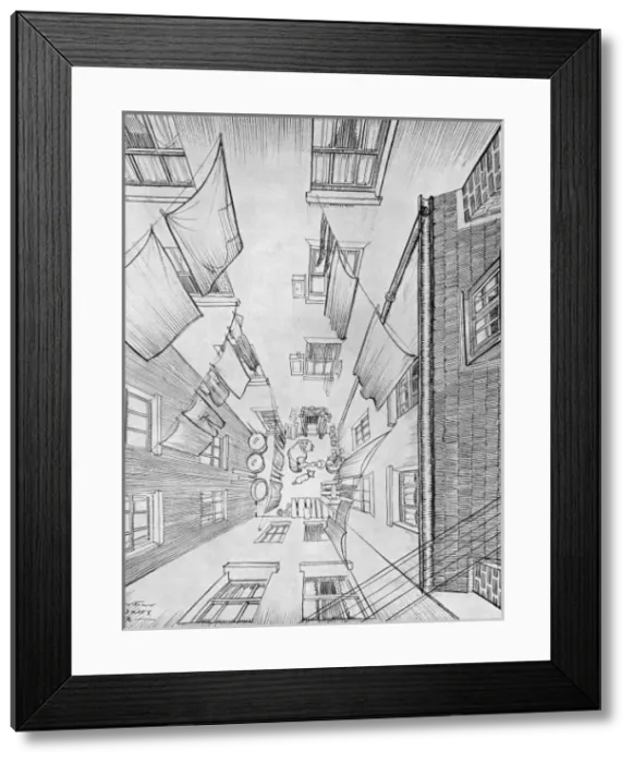 Framed Print : A gardener watering his flowers in his tiny garden Framed Print : A gardener watering his flowers in his tiny garden
