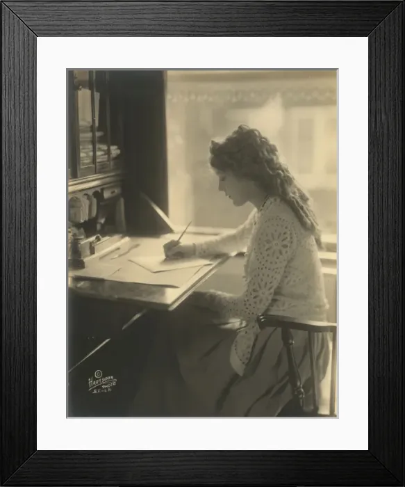 Framed Print : Mary Pickford writing at a desk Framed Print : Mary Pickford writing at a desk