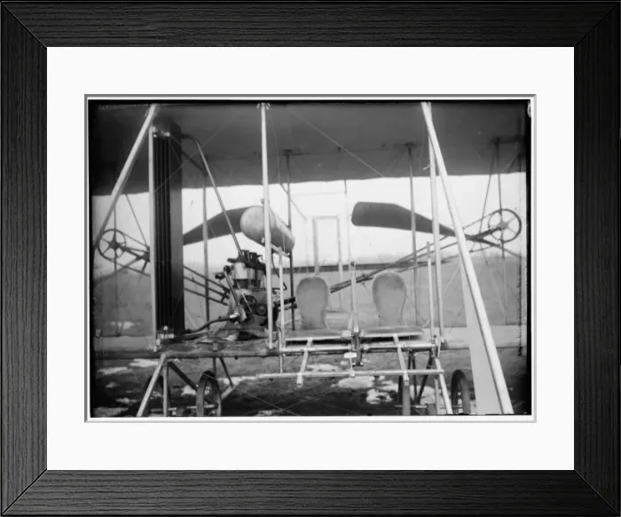 Framed Print : Close-up view of airplane, including the pilot and passenger Framed Print : Close-up view of airplane, including the pilot and passenger