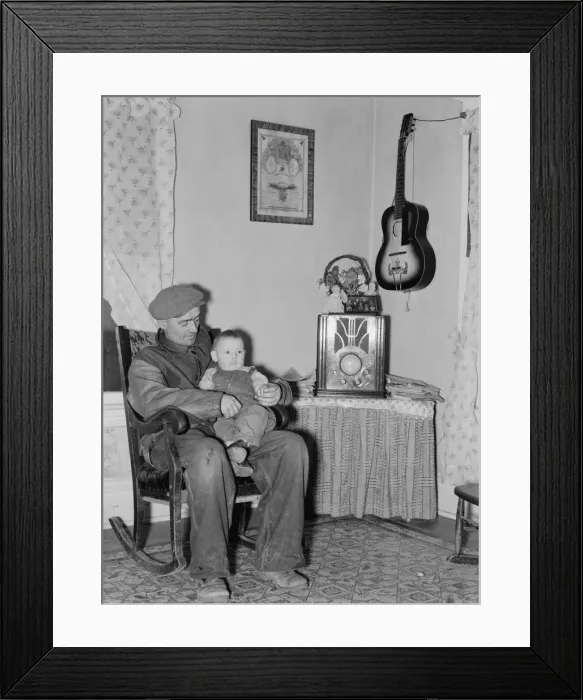 Framed Print : Blaze Gallagher and youngest son in home at Crosby, North Da