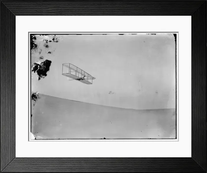 Framed Print : Wilbur gliding down steep slope of Big Kill Devil Hill; Kitt Framed Print : Wilbur gliding down steep slope of Big Kill Devil Hill; Kitt