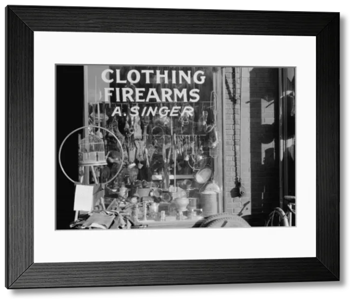 Framed Print : Secondhand goods. Note surgical instruments in window, Omaha