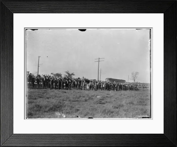 Framed Print : Large crowd of spectators gathered at the edge of a field Framed Print : Large crowd of spectators gathered at the edge of a field