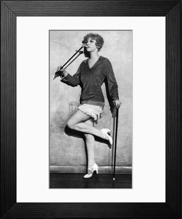 Framed Print : Frances Day with an unusual cigarette holder Framed Print : Frances Day with an unusual cigarette holder