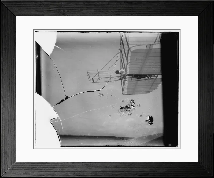 Framed Print : Side view of Wilbur Wright piloting a glider in level flight Framed Print : Side view of Wilbur Wright piloting a glider in level flight