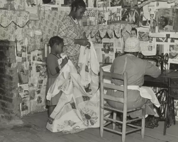 Sewing a quilt. Gees Bend, Alabama