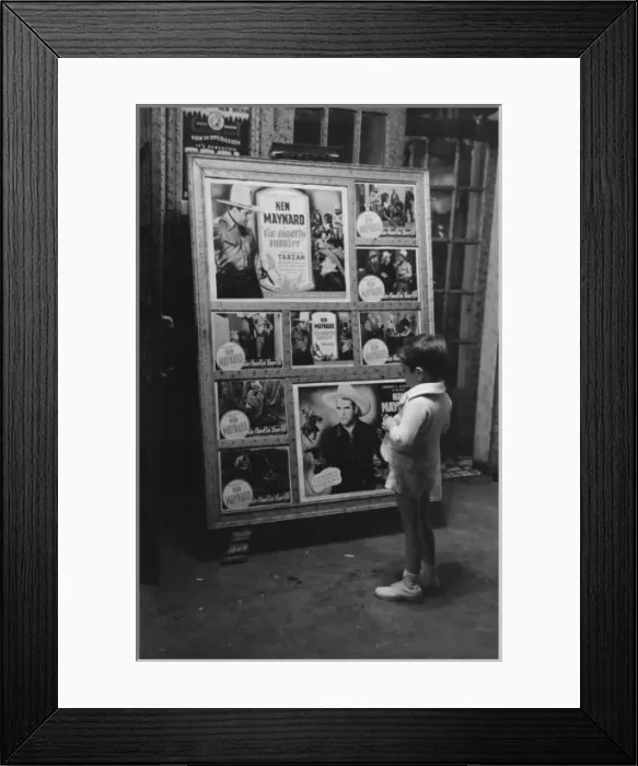 Framed Print : Little boy looking at movie display, New Iberia, Louisiana Framed Print : Little boy looking at movie display, New Iberia, Louisiana