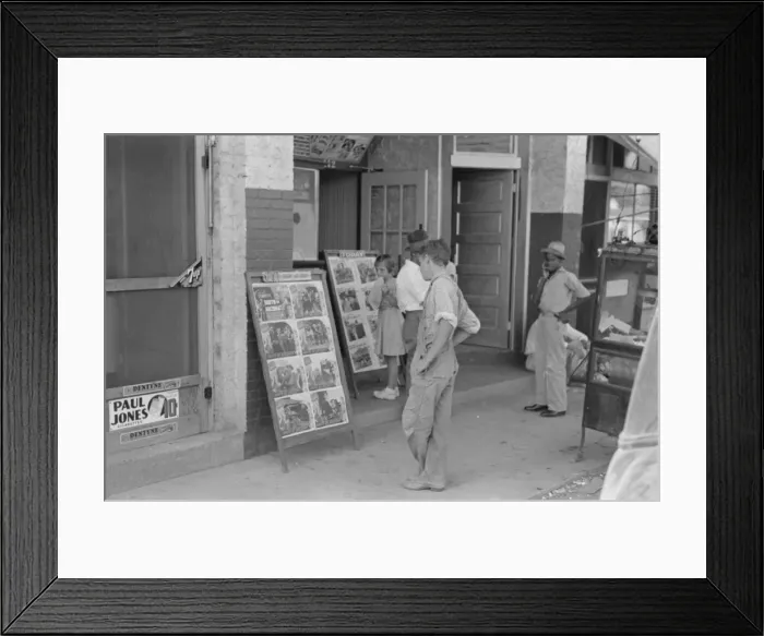 Framed Print : Children looking at posters in front of movie, Saturday, Ste Framed Print : Children looking at posters in front of movie, Saturday, Ste