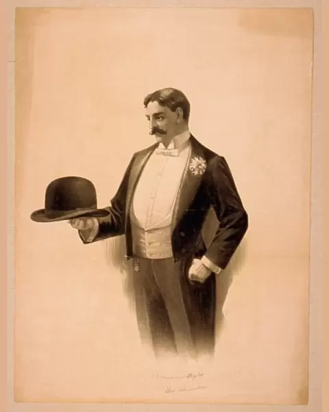 Man wearing tuxedo, holding bowler hat