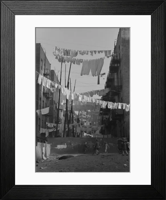 Framed Print : An avenue of clothes washings between 138th and 139th Street Framed Print : An avenue of clothes washings between 138th and 139th Street