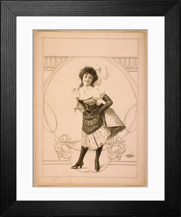 Framed Print : Woman wearing short skirted dress with hands on hips and fea Framed Print : Woman wearing short skirted dress with hands on hips and fea