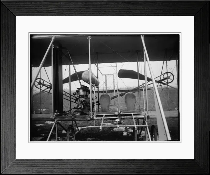 Framed Print : Close-up view of airplane, including the pilot and passenger Framed Print : Close-up view of airplane, including the pilot and passenger