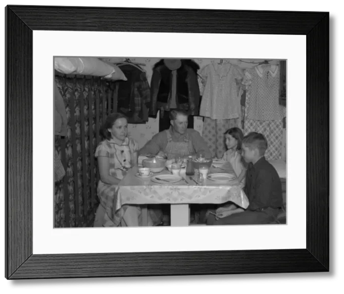 Framed Print : Marcus Miller and family in shack that he built himself. Spe Framed Print : Marcus Miller and family in shack that he built himself. Spe