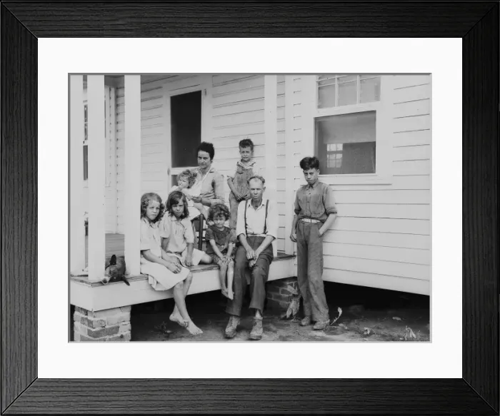 Framed Print : John Bunyan Locklear and family on porch of new home. Pembro