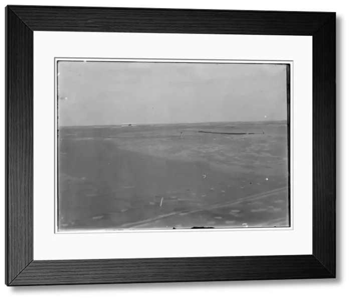 Framed Print : Distant view of the Wright airplane just after landing, take Framed Print : Distant view of the Wright airplane just after landing, take