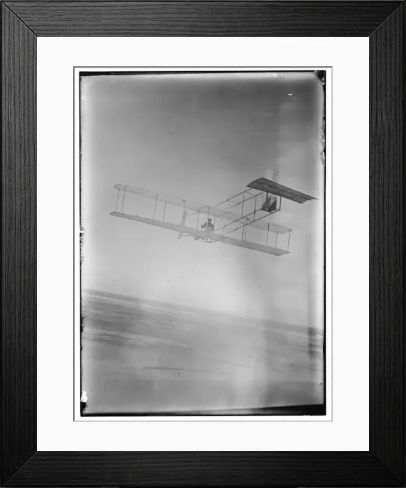 Framed Print : Three-quarter left rear view of glider in flight at Kitty Ha Framed Print : Three-quarter left rear view of glider in flight at Kitty Ha