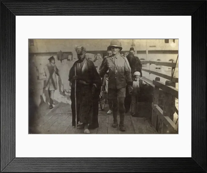 Framed Print : Egypt - British Soldier escorting an old blind Arab man Framed Print : Egypt - British Soldier escorting an old blind Arab man