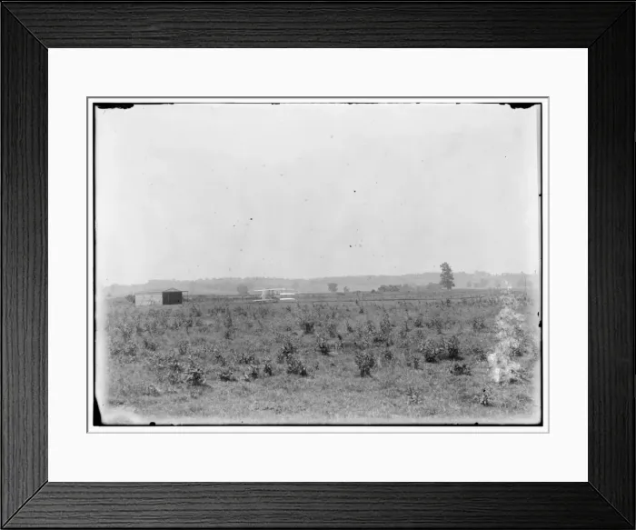 Framed Print : Long-range view of machine on launching track, showing hanga Framed Print : Long-range view of machine on launching track, showing hanga