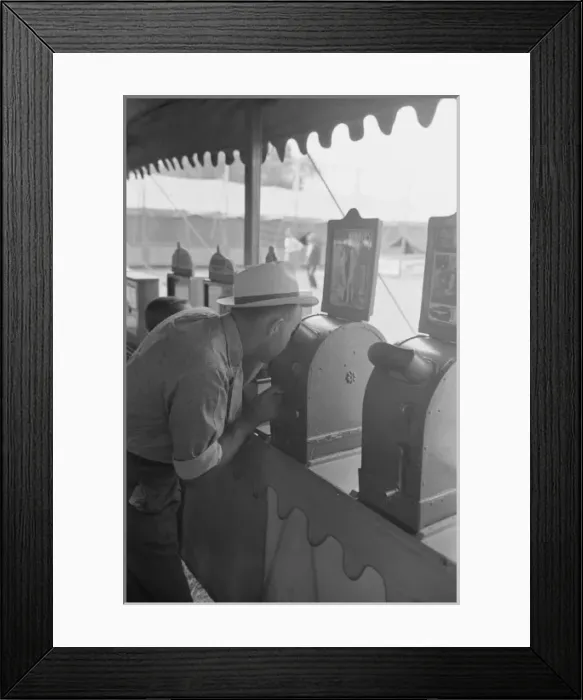 Framed Print : Man looking through penny peep show, state fair, Donaldsonvi Framed Print : Man looking through penny peep show, state fair, Donaldsonvi