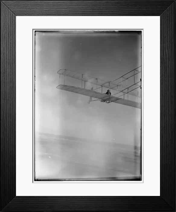 Framed Print : Three-quarter left rear view of glider in flight at Kitty Ha Framed Print : Three-quarter left rear view of glider in flight at Kitty Ha