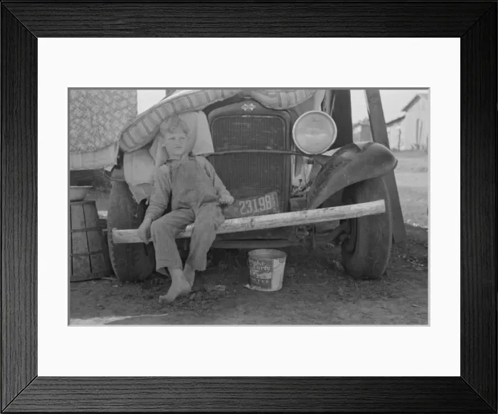 Framed Print : Son of white migrant sitting on bumper of their truck, Wesla Framed Print : Son of white migrant sitting on bumper of their truck, Wesla