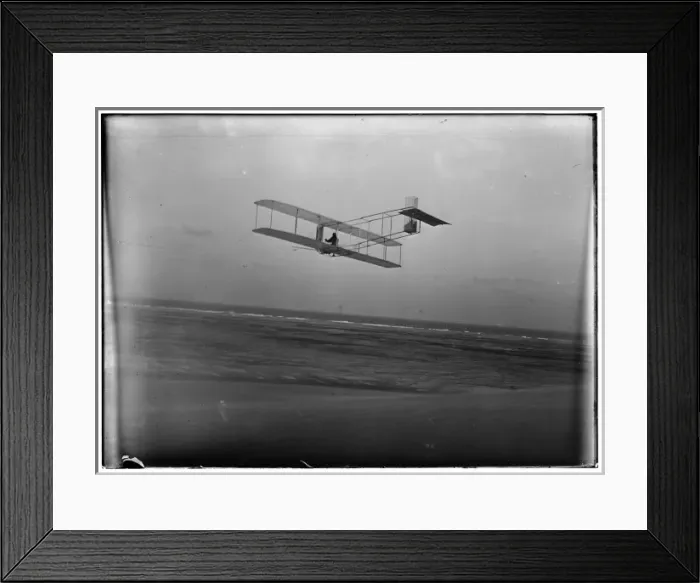 Framed Print : Three-quarter left rear view of glider in flight at Kitty Ha Framed Print : Three-quarter left rear view of glider in flight at Kitty Ha
