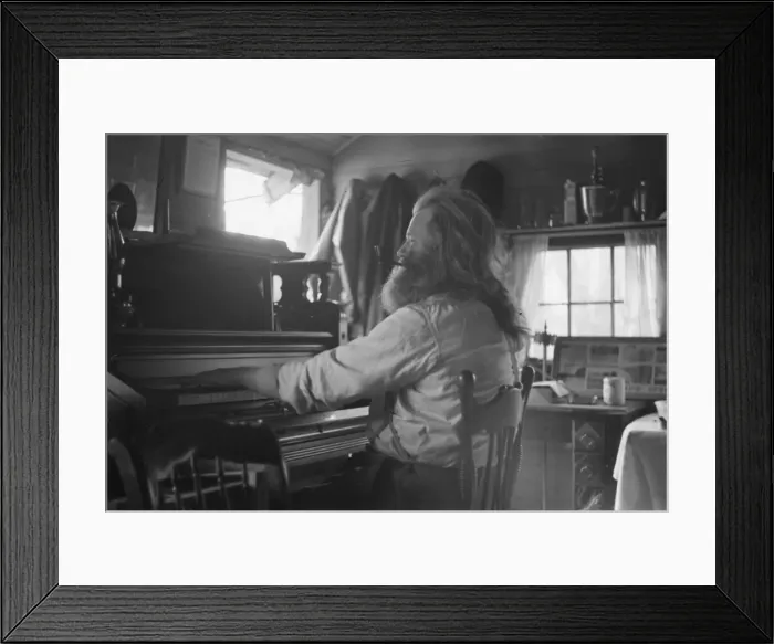 Framed Print : The Hermit of Maine playing the unique musical instrument, F Framed Print : The Hermit of Maine playing the unique musical instrument, F