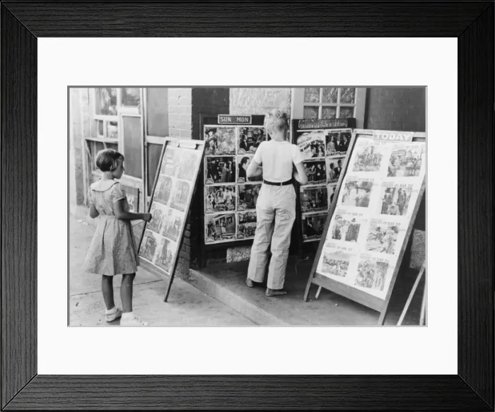 Framed Print : Children looking at posters in front of movie, Saturday, Ste Framed Print : Children looking at posters in front of movie, Saturday, Ste