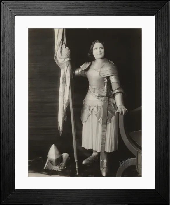 Framed Print : Geraldine Farrar, dressed in costume as Joan of Arc, holding Framed Print : Geraldine Farrar, dressed in costume as Joan of Arc, holding