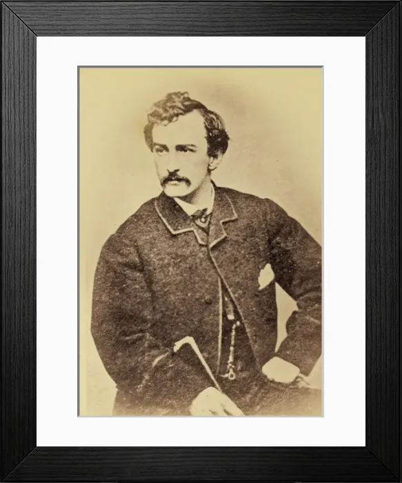Framed Print : John Wilkes Booth, half-length portrait, facing left and hol Framed Print : John Wilkes Booth, half-length portrait, facing left and hol