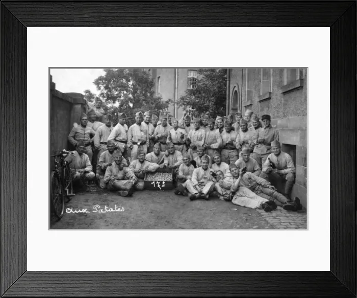 Framed Print : Soldiers posing for a photo with a box of potatoes Framed Print : Soldiers posing for a photo with a box of potatoes