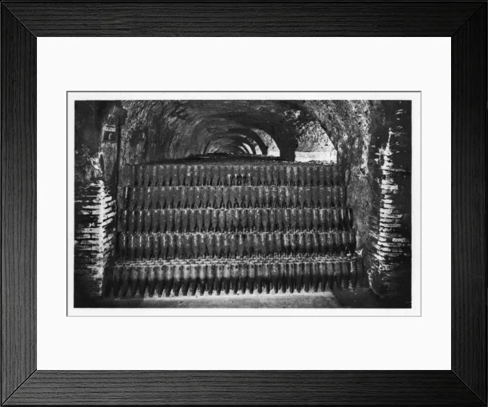 Framed Print : Wine bottles stored in a cellar, gathering dust Framed Print : Wine bottles stored in a cellar, gathering dust