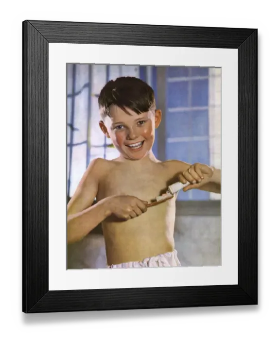 Framed Print : A boy cleaning his teeth Framed Print : A boy cleaning his teeth